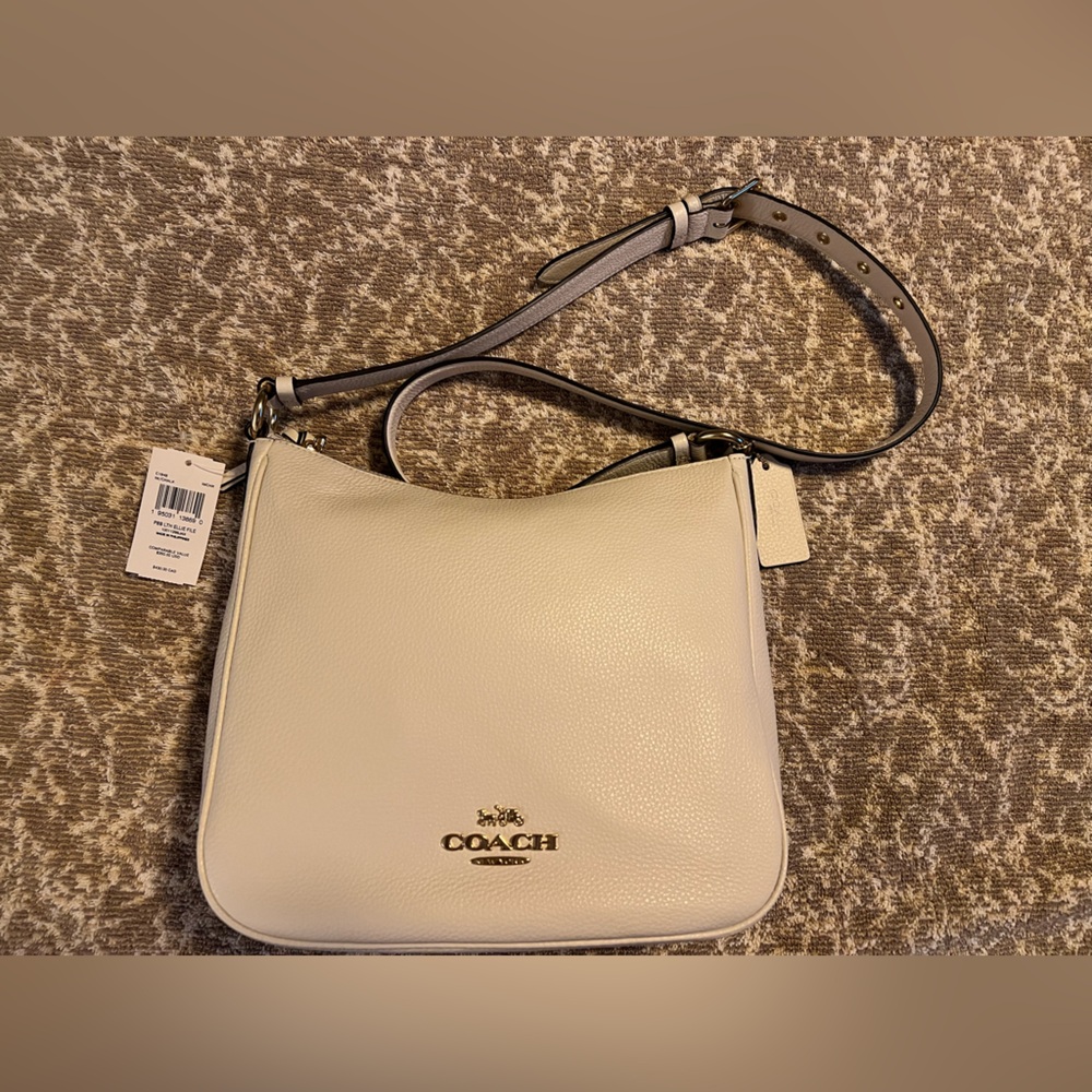 Brand new Coach Ellie File handbag/crossbody
Color: Chalk